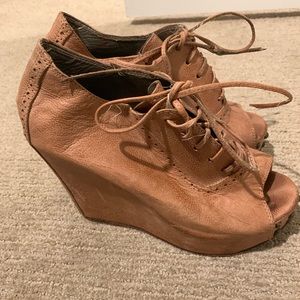 Prune leather tan wedge booties from Argentina